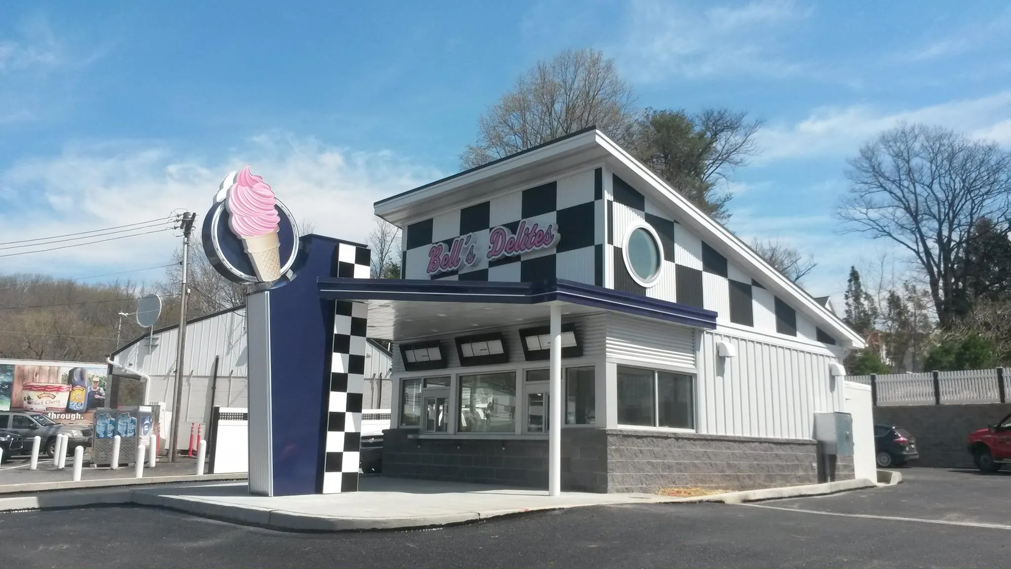 Bell's Delites storefront with checkerboard exterior and soft serve cone sign, Parkesburg, PA